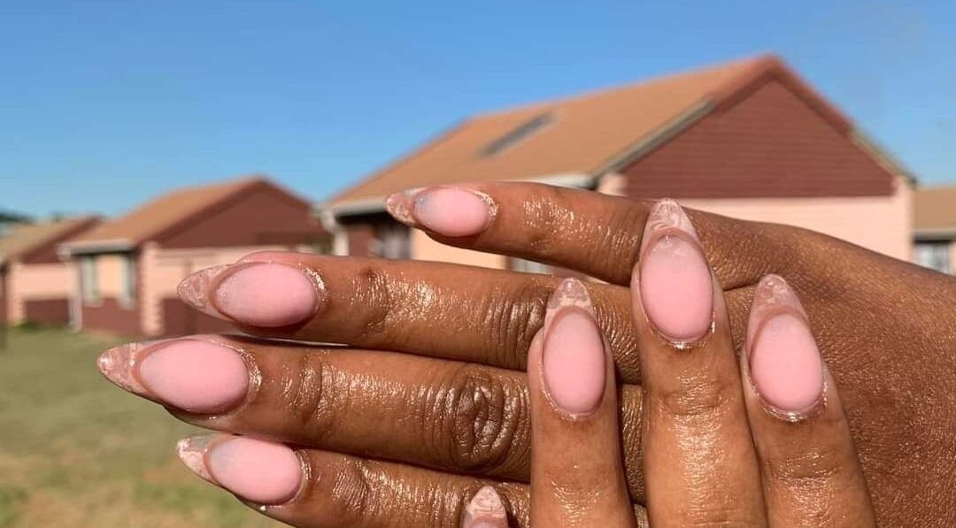 Elegant pink nails at Nenebeauty bar, Centurion, Gauteng, ZA, showcasing expert manicure designs.