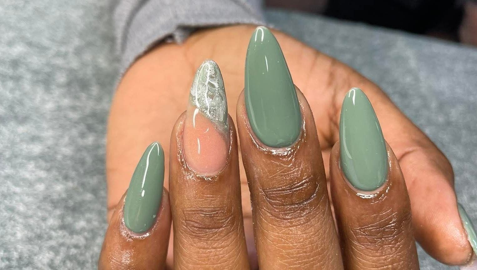 Stylish green nails at Hair, Nails and Beauty Studio, Centurion, Gauteng, ZA showcase elegant nail artistry.