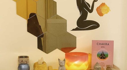 Peaceful decor at The Spa Room, Singapore, Singapore, SG, featuring chakra art and serene ambiance.