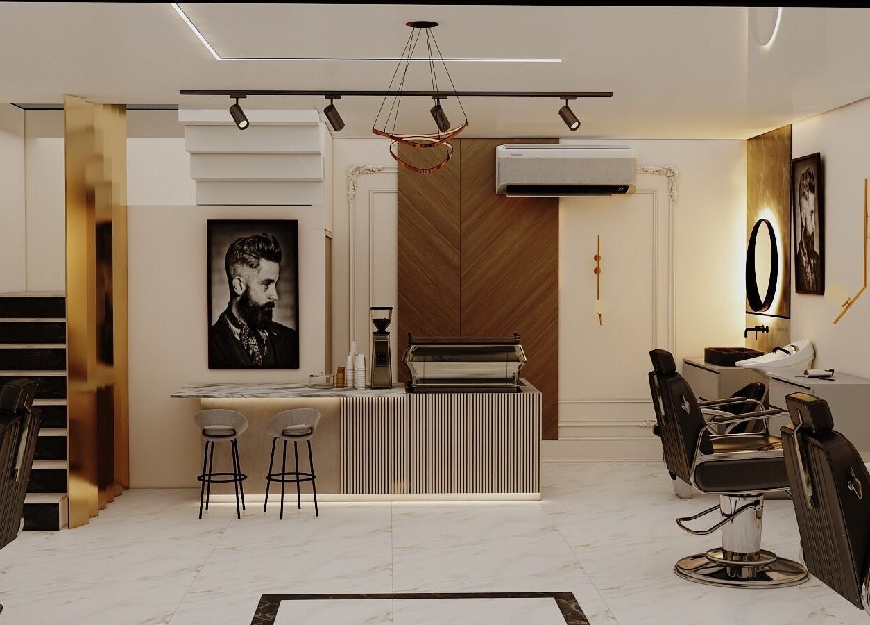 Interior of Grand Saloon in Amman, JO showing stylish chairs and sleek decor.