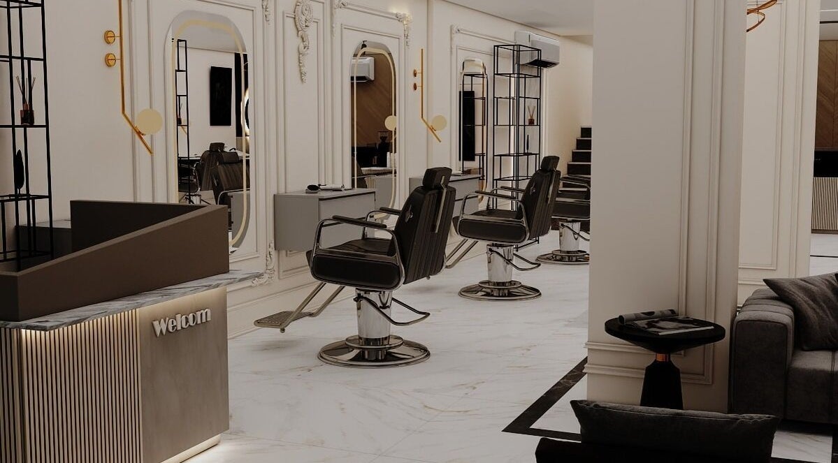 Luxurious interior of Grand Saloon, Amman, JO, featuring stylish salon chairs and ornate mirrors.