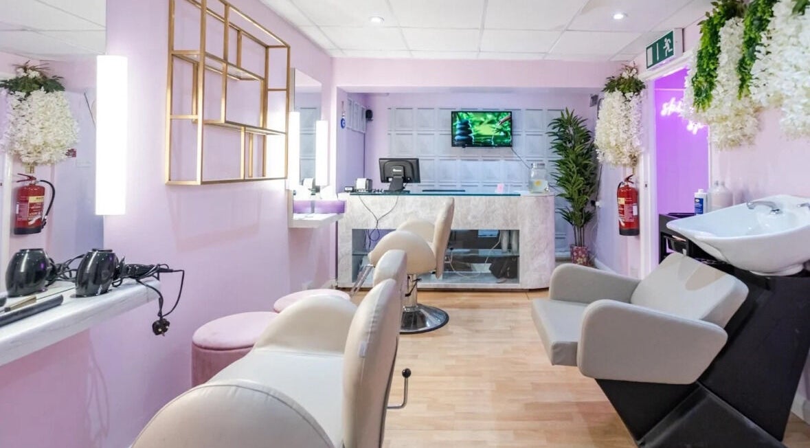 Interior of Skinsational Spa in London, England, GB, featuring modern decor and plush seating for a relaxing experience.