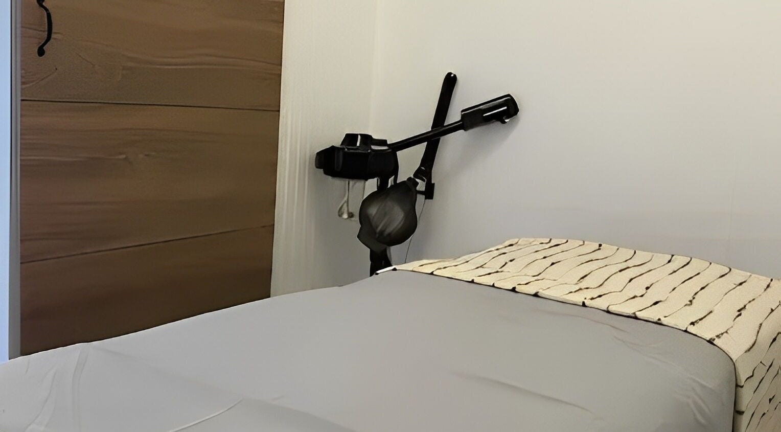 Comfortable treatment room at MP Spa and Aesthetics Clinic, Oistins, Christ Church, BB, showcasing a massage bed.