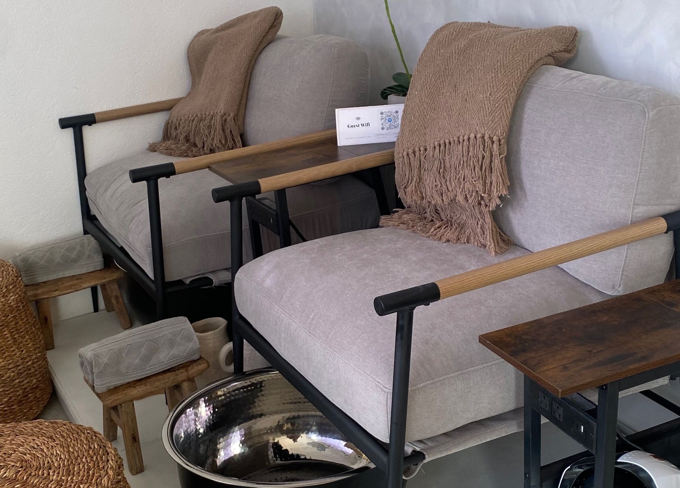 Serene seating area at MP Spa and Aesthetics Clinic, Oistins, Christ Church, BB with cushioned chairs.