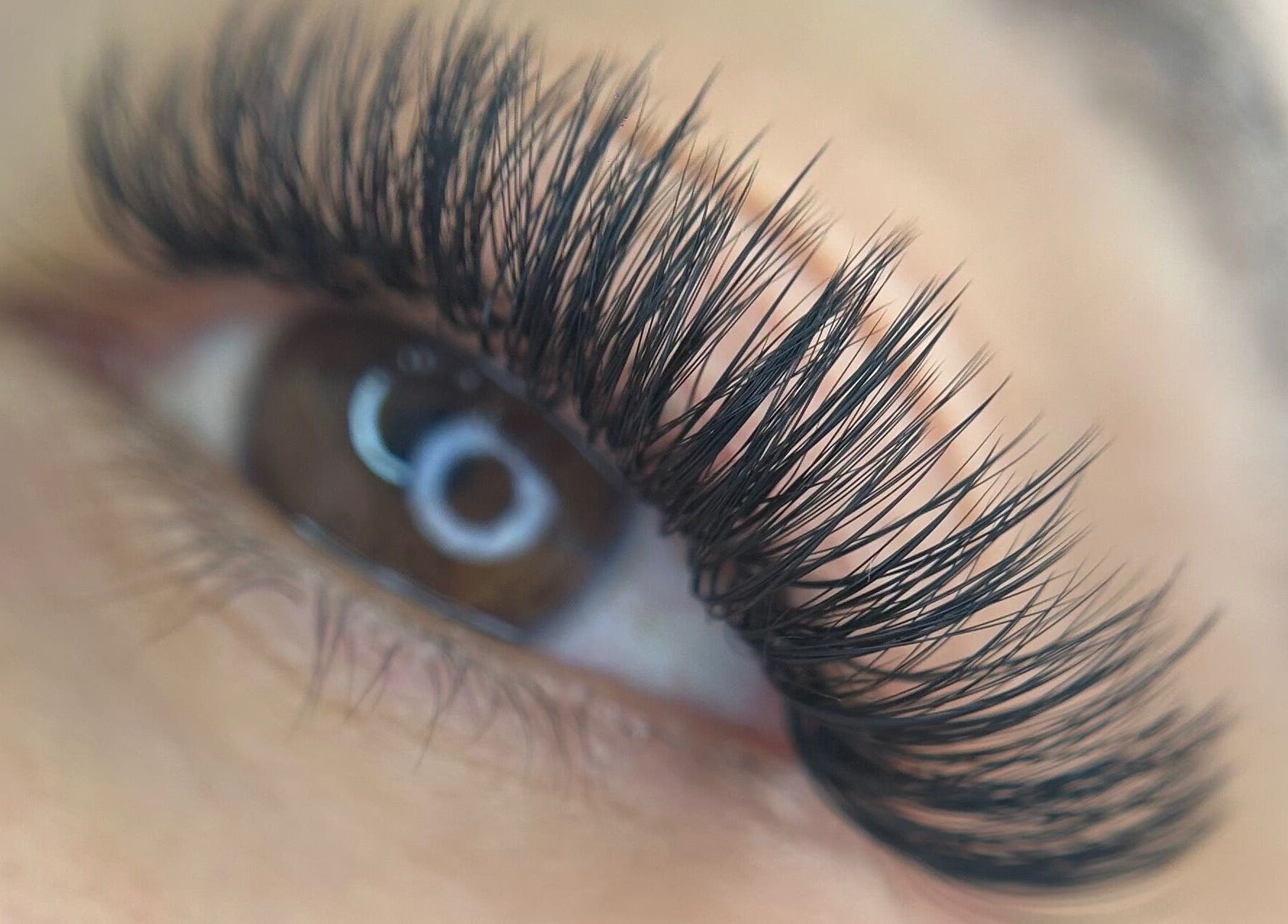 Closeup of expertly applied eyelash extensions at Lash Lunar in Cape Town, Western Cape, ZA.