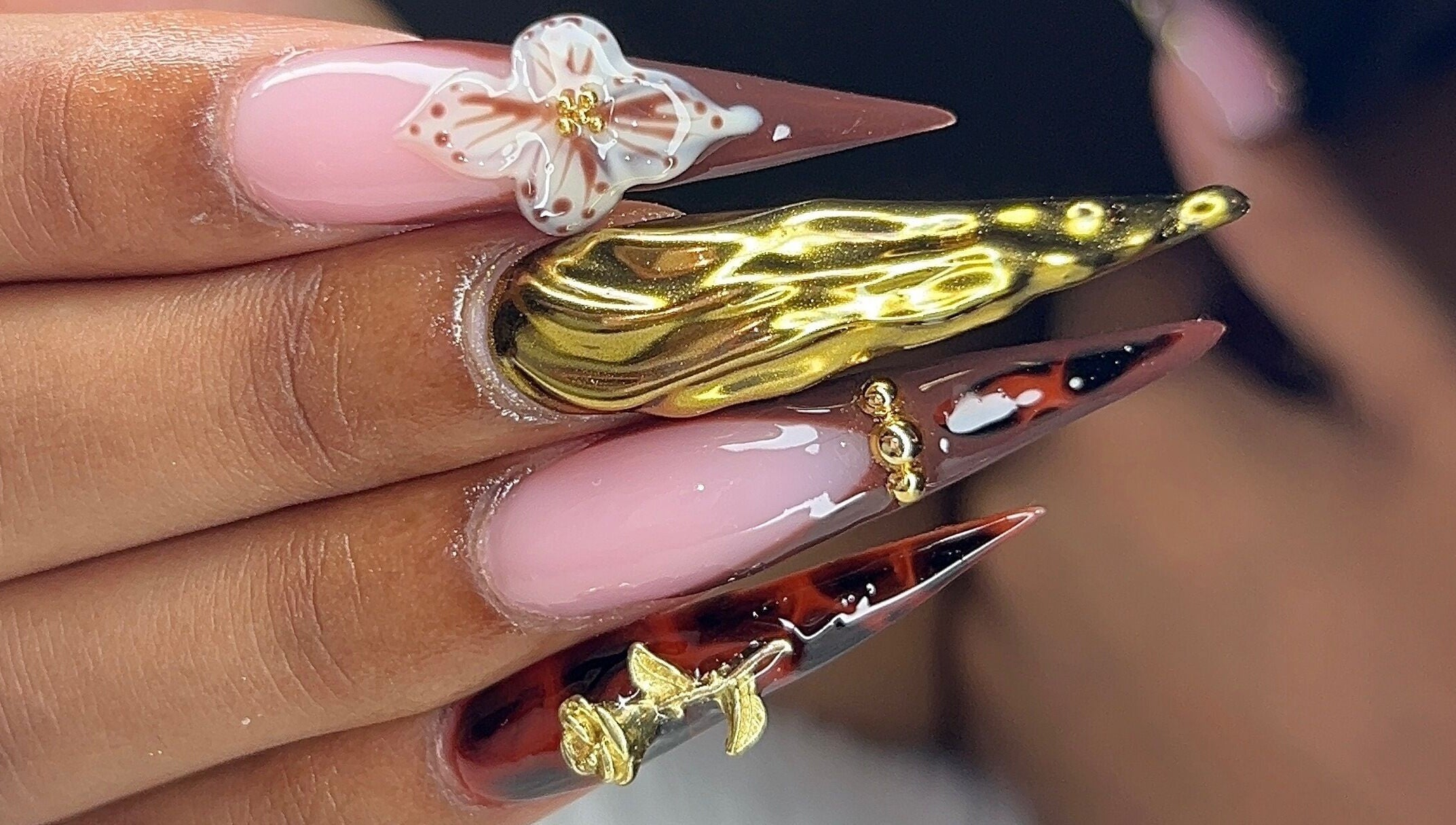 Exquisite nail art with gold accents at Poly_ by_Blitz in Bridgetown, Saint Michael, BB.