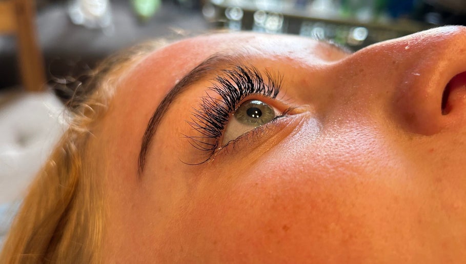 Close-up of styled eyelashes by Beauty By Emily May in Tibshelf, England, GB. Showcasing lush lash extensions.