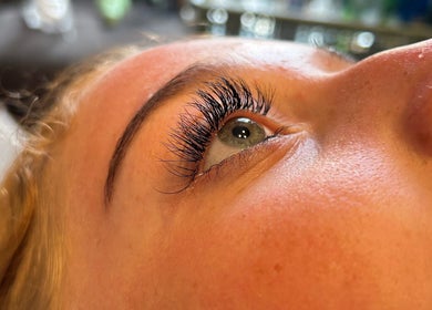 Close-up of styled eyelashes by Beauty By Emily May in Tibshelf, England, GB. Showcasing lush lash extensions.