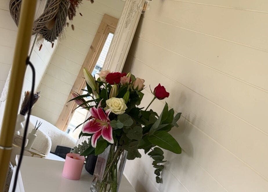 Elegant floral arrangement at Daisy Lee Lashes and Brows, Bingley, England, GB, enhancing serene interior decor.