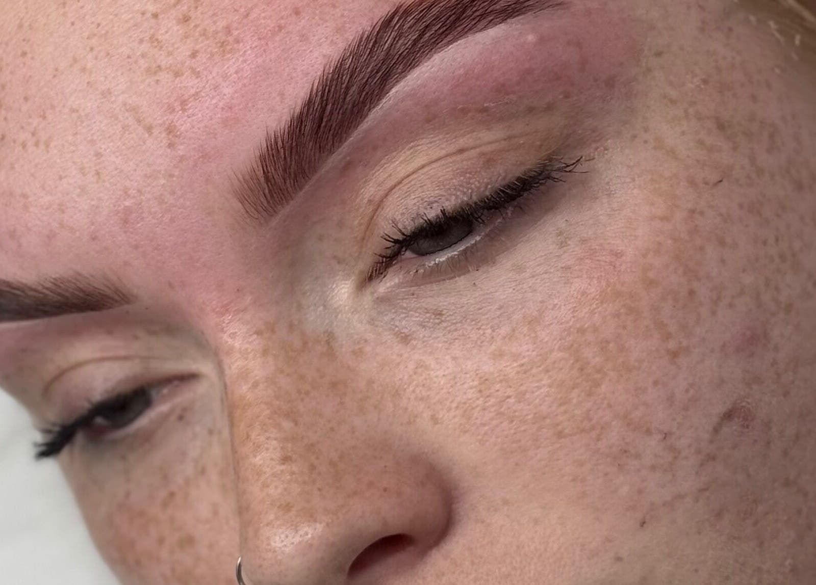 Close-up of expertly shaped eyebrows at Daisy Lee Lashes and Brows, Bingley, England, GB.