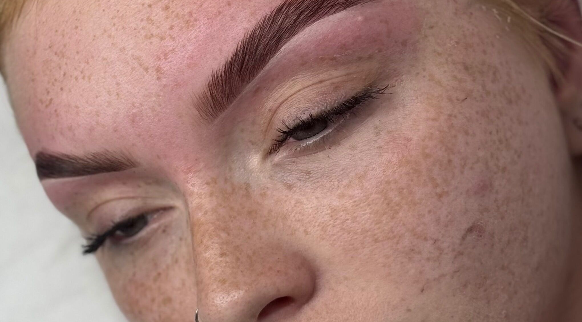 Close-up of expertly shaped eyebrows at Daisy Lee Lashes and Brows, Bingley, England, GB.