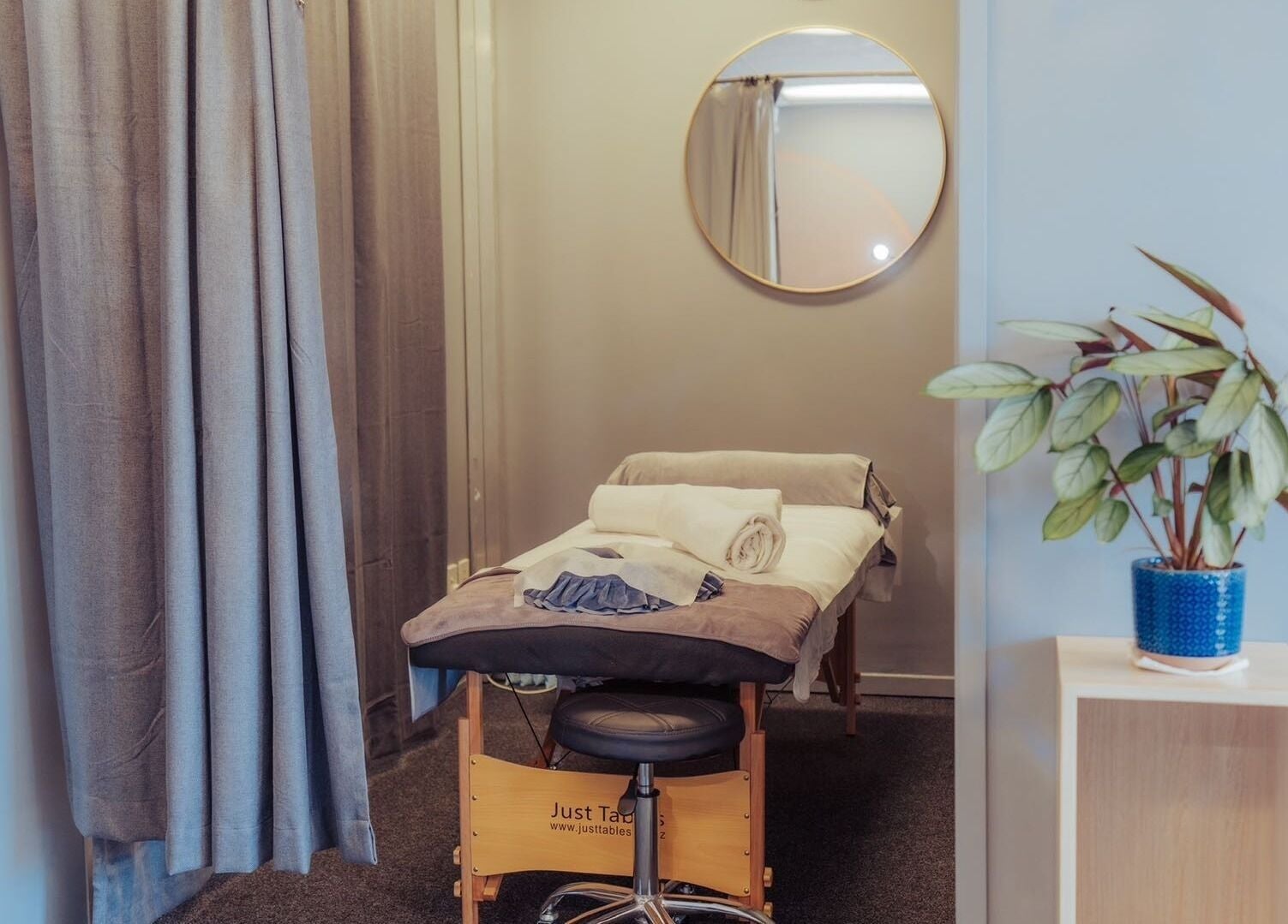 Relaxing massage room at JM's Massage in Auckland, Auckland, NZ with a comfortable table and calming decor.