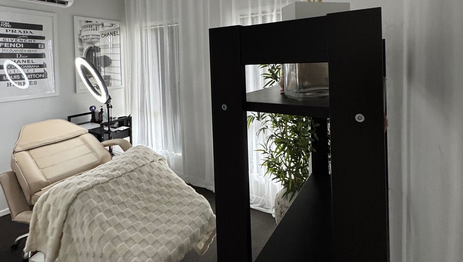 Calm treatment room at Bek Moran Artistry, Burpengary East, Queensland, AU, featuring stylish decor and cozy seating.