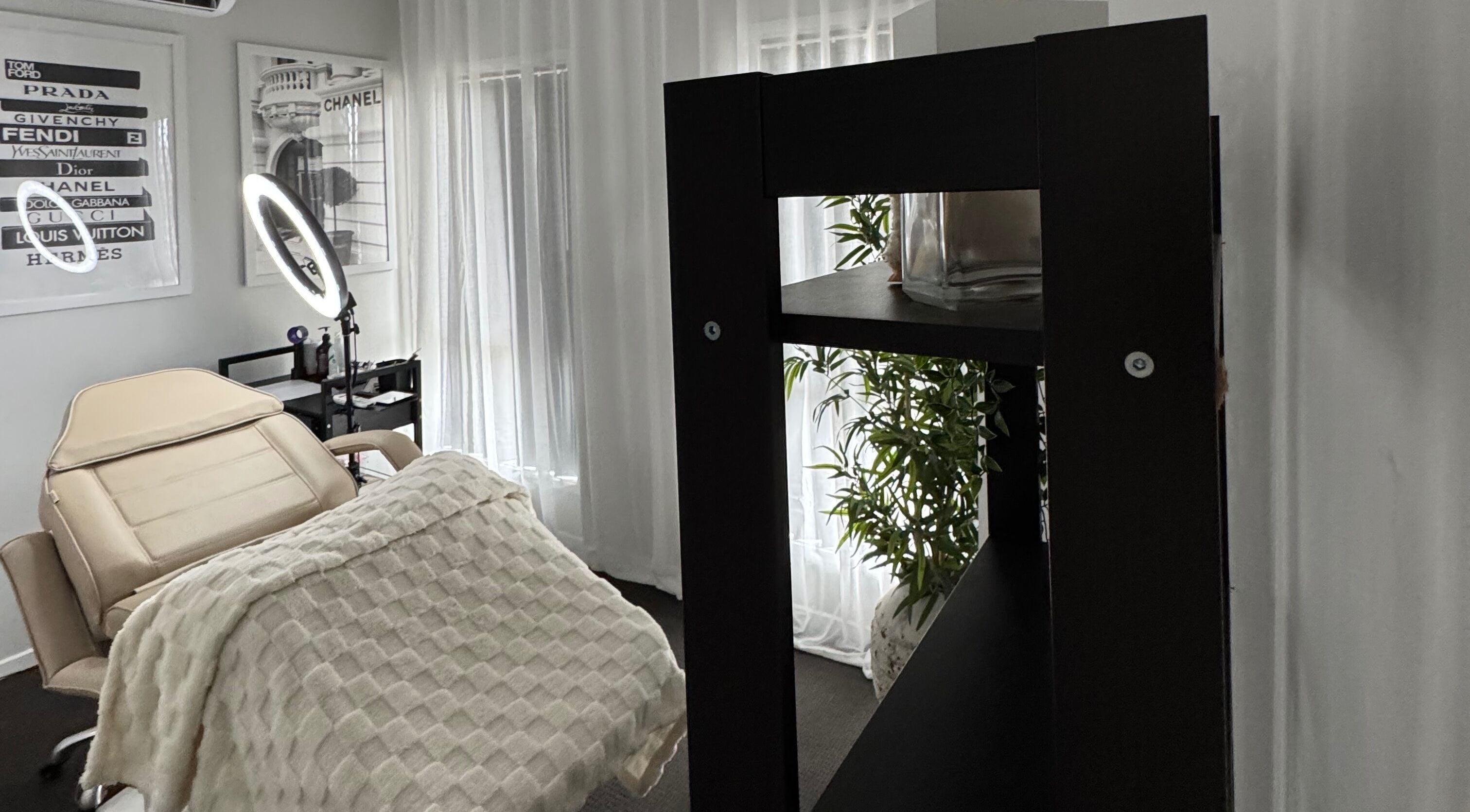 Calm treatment room at Bek Moran Artistry, Burpengary East, Queensland, AU, featuring stylish decor and cozy seating.