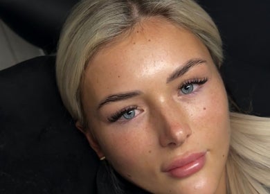 Close-up of a client's radiant skin after treatment at Charli Louise Beauty, Oldland Common, England, GB.