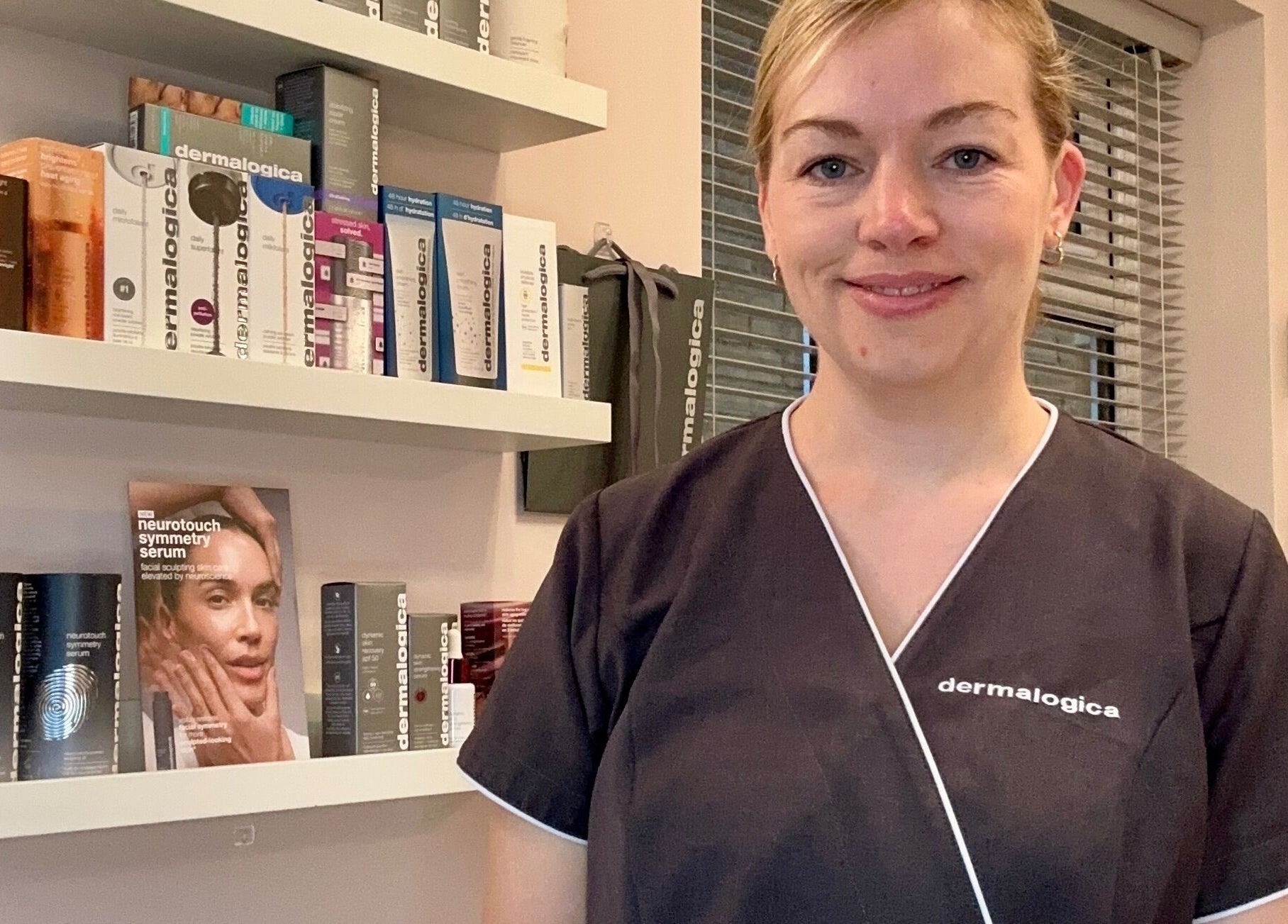 Professional consultant at Perfect Touch, Wallingford, England, GB, showcasing premium skincare products.