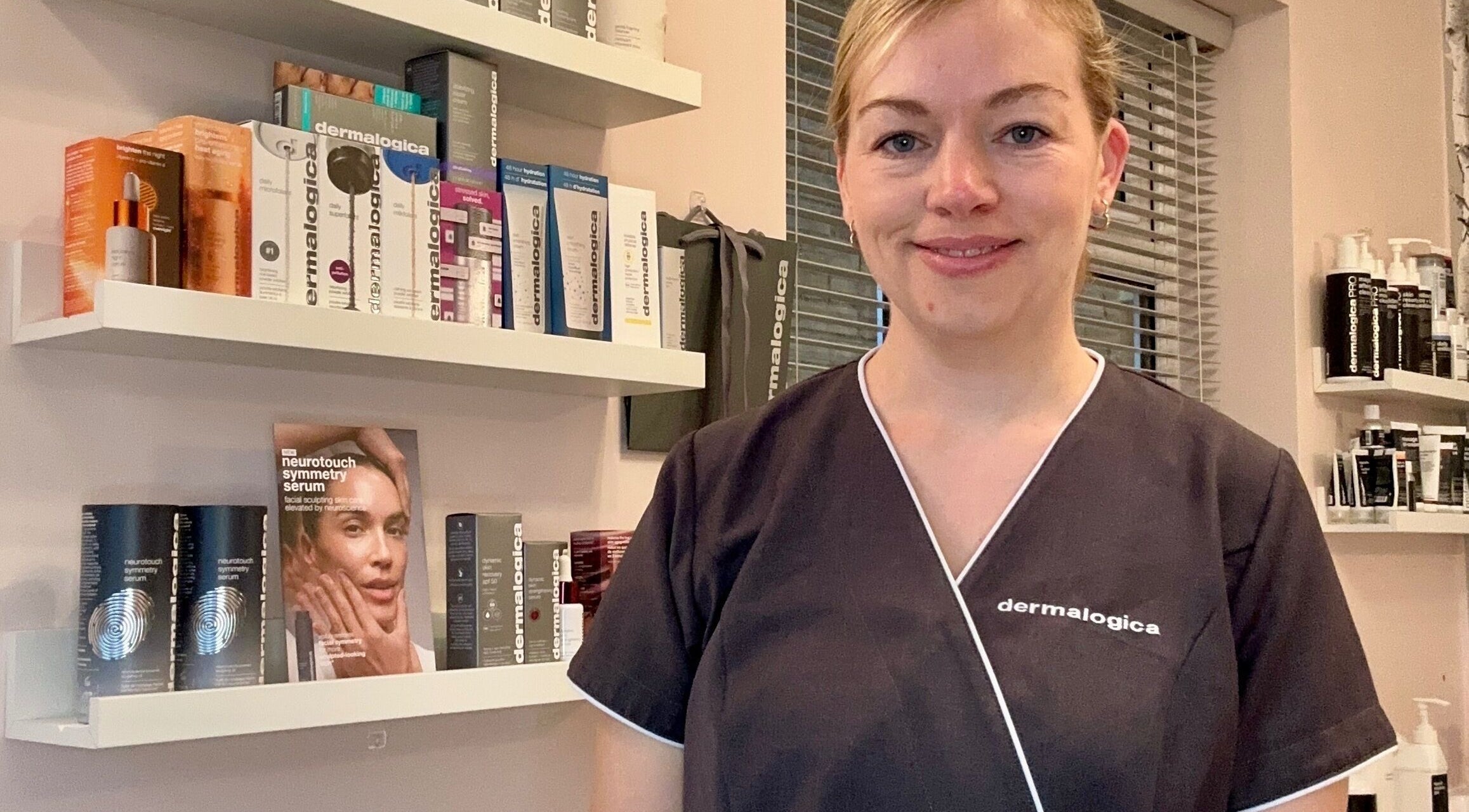 Professional consultant at Perfect Touch, Wallingford, England, GB, showcasing premium skincare products.