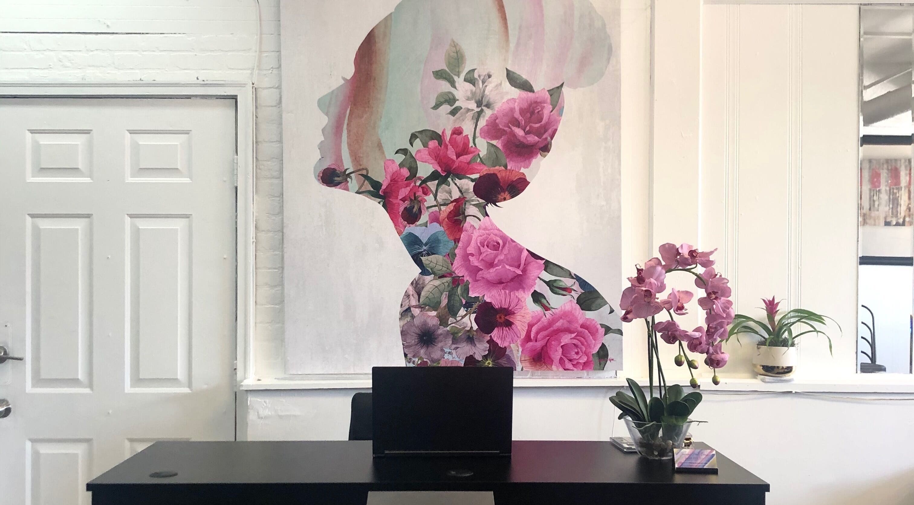 Elegant floral art and orchids at Junior’s Hair Design, Chicago, Illinois, US, reflecting serene style.