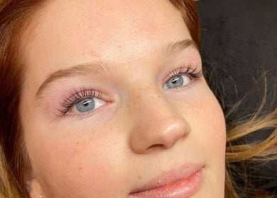 Close-up of a woman's face showcasing eyelash treatment at Lara Beauty Collective, Randwick, New South Wales, AU.