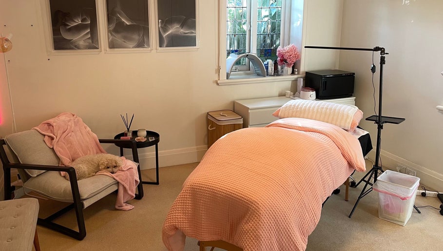 Cozy spa room at Lara Beauty Collective, Randwick, New South Wales, AU with soft lighting and plush decor.