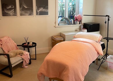 Cozy spa room at Lara Beauty Collective, Randwick, New South Wales, AU with soft lighting and plush decor.