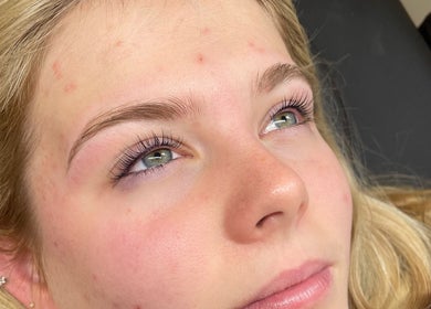 Close-up of a woman's rejuvenated skin and lashes at Lara Beauty Collective, Randwick, New South Wales, AU.