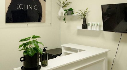 Natalie ProBeauty reception desk with plants in Great Shelford, England, GB. Modern design and decor.
