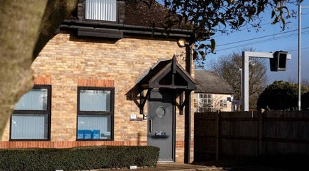 Charming exterior of Natalie ProBeauty in Great Shelford, England, GB, with brick detail and modern design.