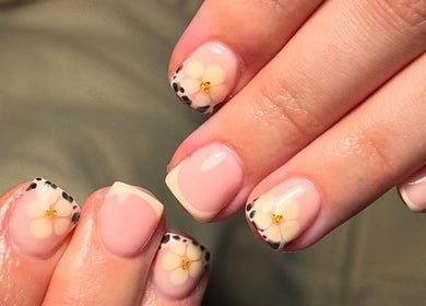 Elegant floral nail art at Beauty Bliss By Becca in Annan, Scotland, GB. Perfect blend of style and luxury.