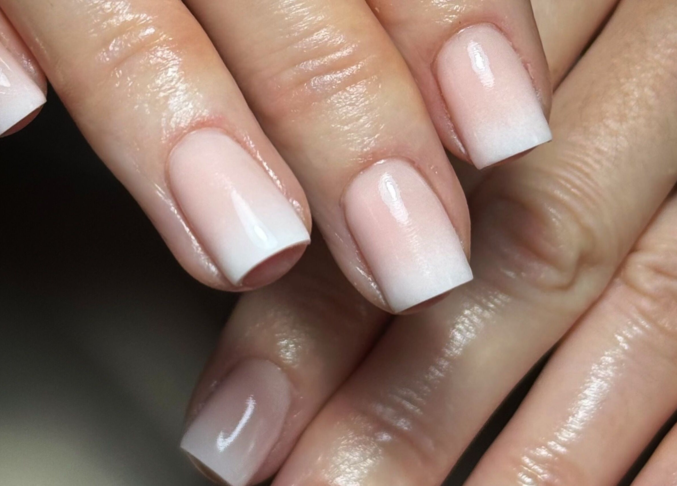 Elegant ombre manicure at Beauty Bliss By Becca, Annan, Scotland, GB showcasing polished nails.