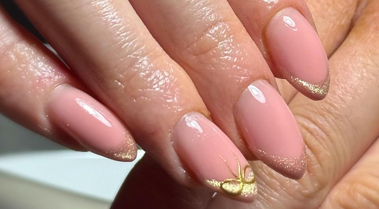 Elegant pink nails with gold accents at Beauty Bliss By Becca, Annan, Scotland, GB.