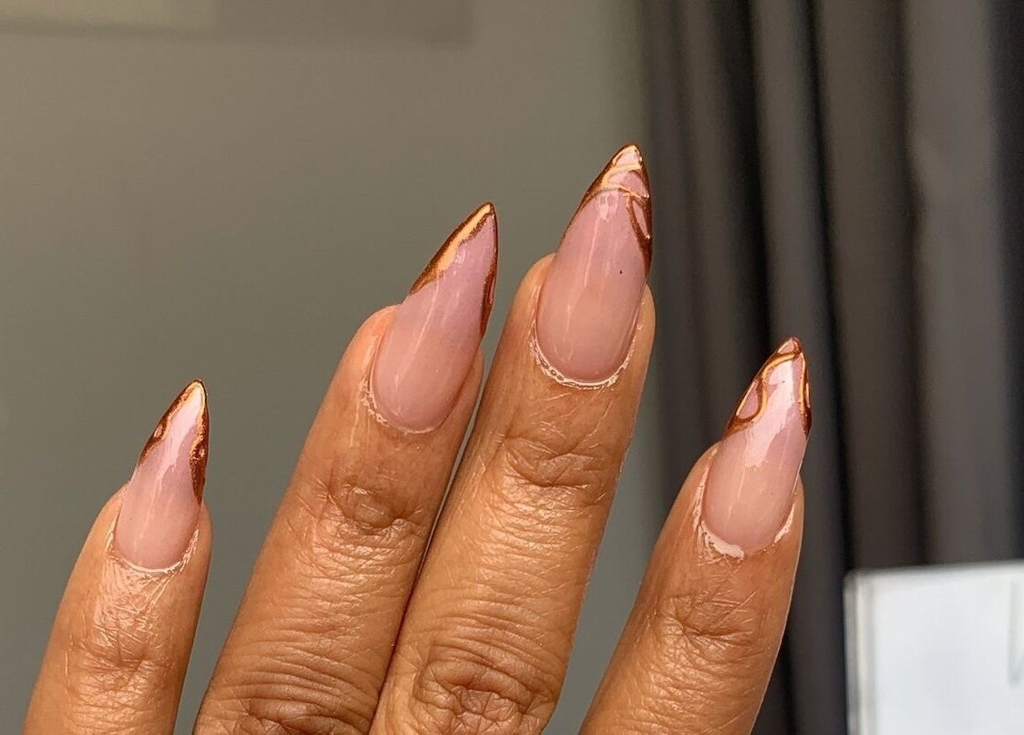 Close-up of elegant nail art design at Nami Lagos, Lagos, Lagos, NG.