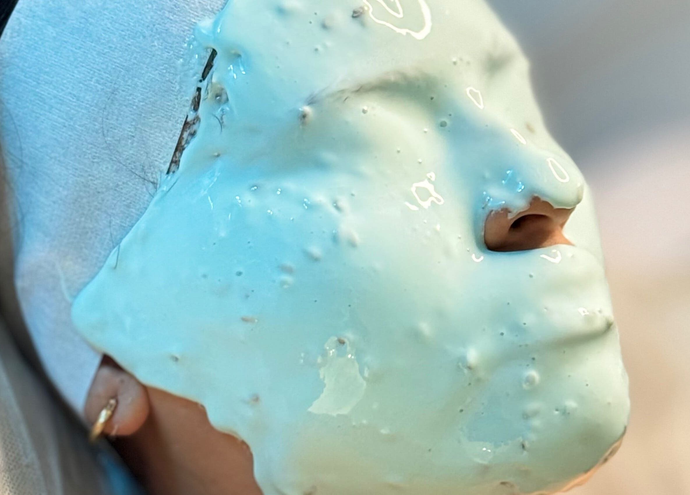 Relaxing facial mask treatment at Bellas Glow Beauty in London, England, GB. Experience ultimate skincare.