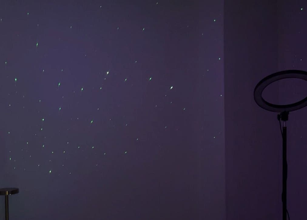 Serene starry night ambiance at Bellas Glow Beauty in London, England, GB, featuring a ring light setup.