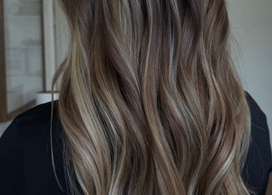 Beautiful wavy hair styled at Wild Roots Studio in Easley, South Carolina, US.