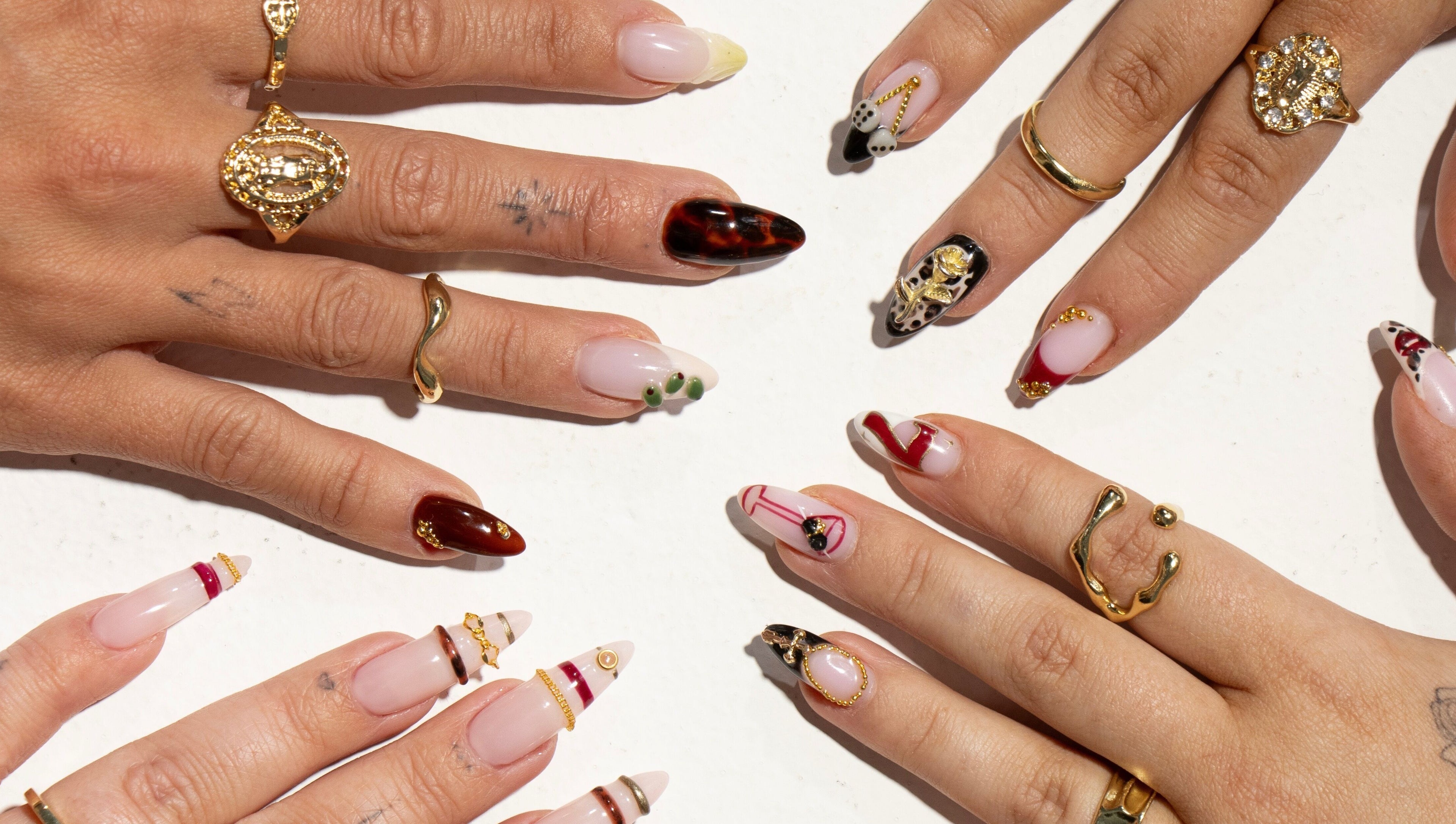 Gel By Jayde showcases artistic nail designs in Melbourne, Victoria, AU with elegant rings and rich colors.