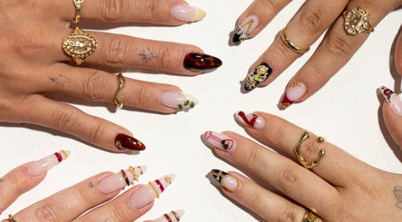 Gel By Jayde showcases artistic nail designs in Melbourne, Victoria, AU with elegant rings and rich colors.