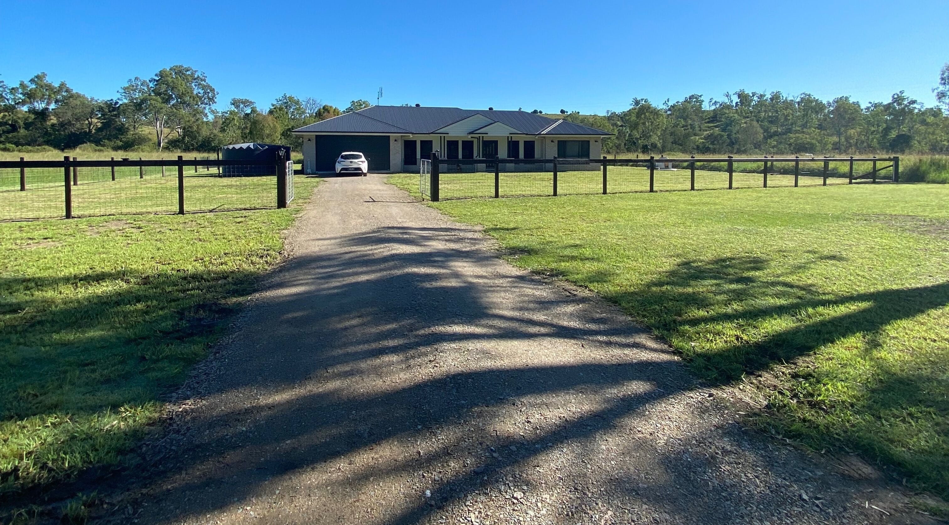 Entrance view of Chloee’s Lash and Brow Bar at Woolmar, Queensland, AU with a spacious lawn.
