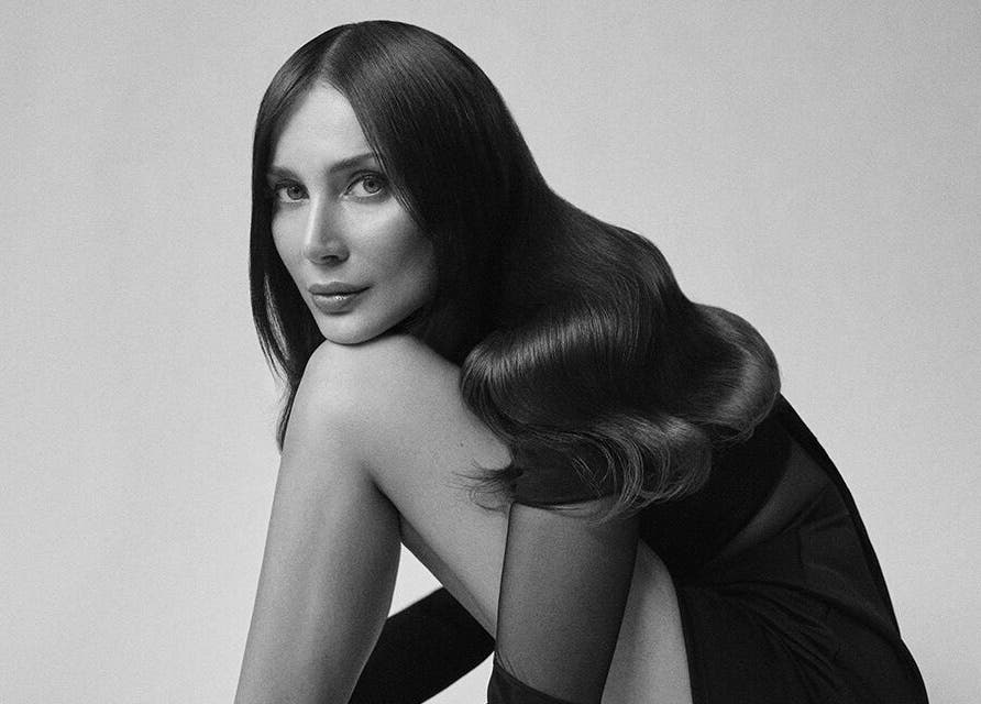 Stylish woman with sleek hair at No.4 West Bridgford, West Bridgford, England, GB.