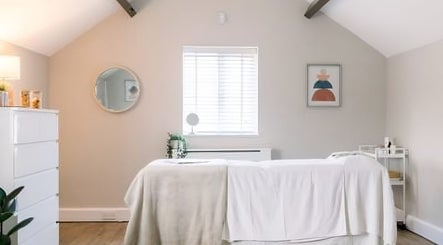 Relaxing therapy room at Birch Barn Therapies, Castlethorpe, England, GB with soft lighting and cozy ambiance.