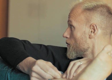 Man enjoying a foot massage at Birch Barn Therapies in Castlethorpe, England, GB for relaxation.