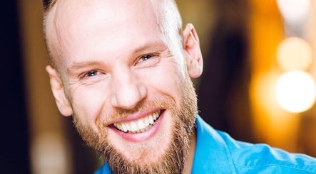 Smiling person enjoying Birch Barn Therapies in Castlethorpe, England, GB.