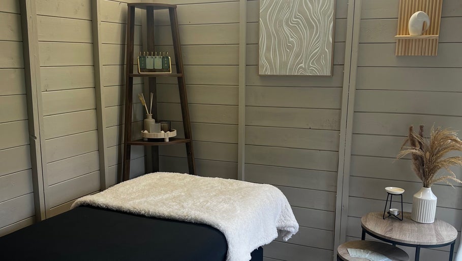 Relaxing spa room at Izzy’s Beauty Room, Gloucester, England, GB with a serene ambiance and stylish decor.