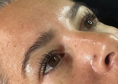 Close-up of a glowing face after treatment at Izzy’s Beauty Room, Gloucester, England, GB.