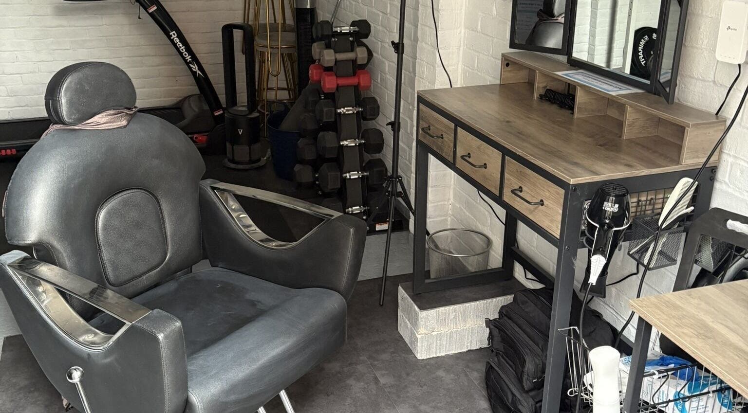 Barber chair and station at Cliffthebarber.com in Runcton, England, GB, offering premium grooming services.