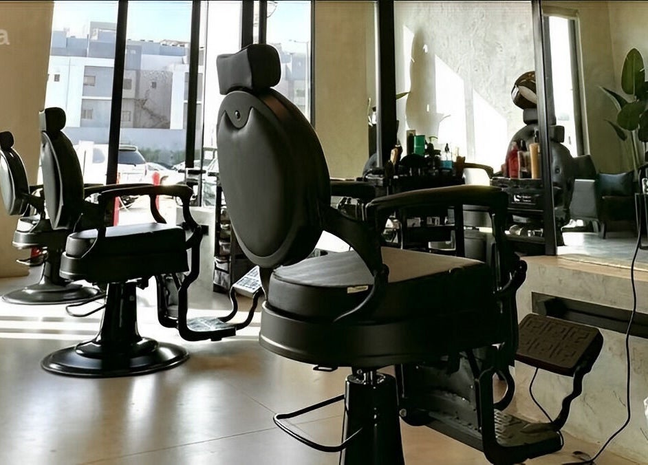 Luxurious salon interior with black chairs at Edge 90 - حافه ٩٠ التعاون, Riyadh, Riyadh Province, SA.