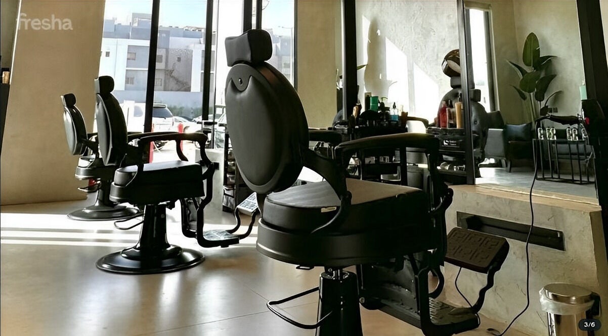 Luxurious salon interior with black chairs at Edge 90 - حافه ٩٠ التعاون, Riyadh, Riyadh Province, SA.