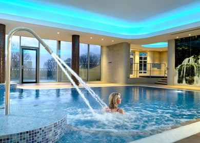 Indoor pool at Spa Sanctuary at Manor House Country Hotel in Enniskillen, Northern Ireland, GB with cascading water.
