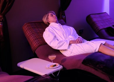 Woman relaxing in spa robe at Spa Sanctuary at Manor House Country Hotel, Enniskillen, Northern Ireland, GB.