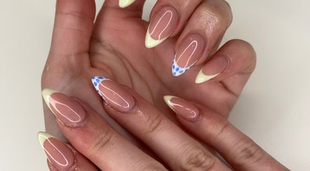 Elegant nail art at Sarah Irvine Beauty in Belfast, Northern Ireland showcasing intricate French tips.